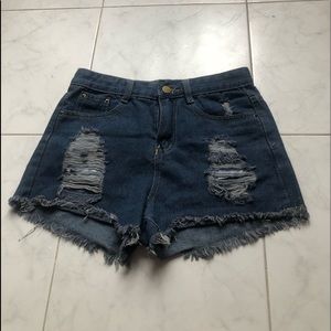 Ripped denim shorts
